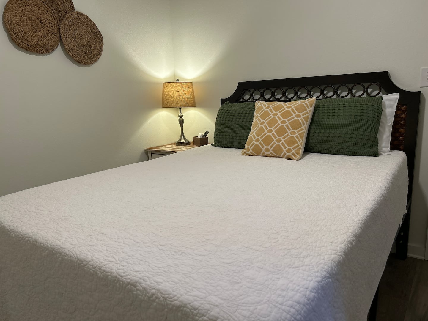 Guest bedroom with queen bed and memory foam mattress at Auer House Pensacola