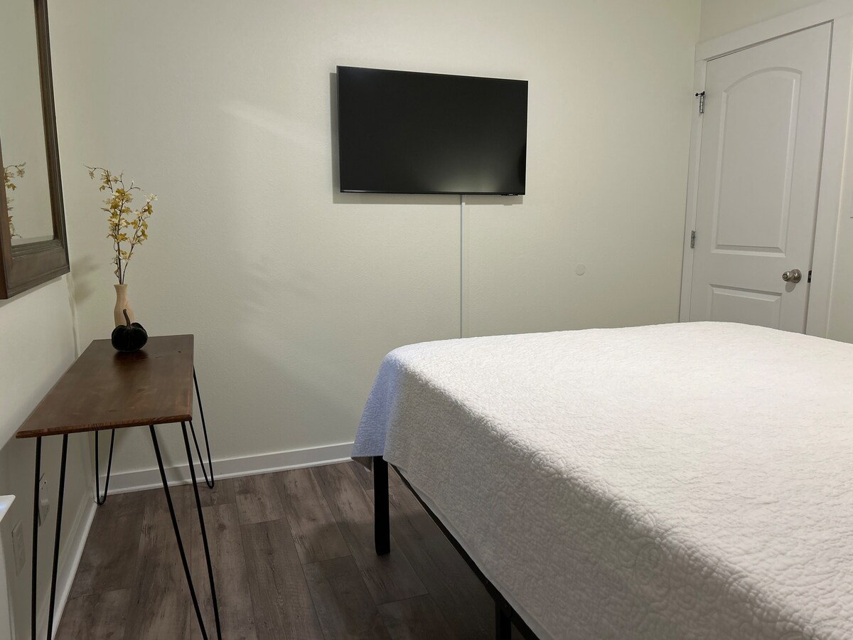Guest bedroom one with ample closet space at Auer House vacation rental